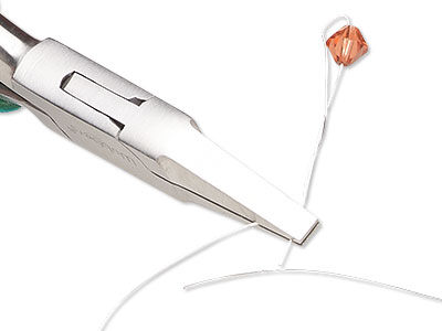 Pliers holding twisted wire with bead